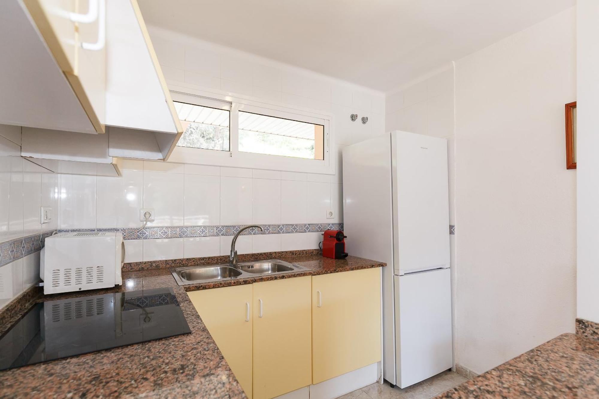 Apartamento UHC Arco del Sol Family Complex Hospitalet De L'Infant Habitación foto